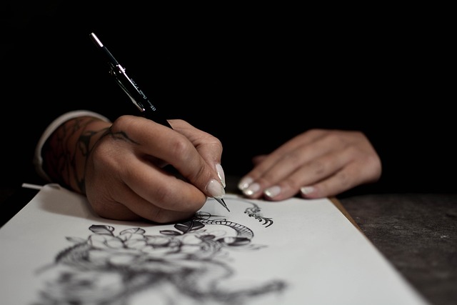 Vancouver tattoo artists reviewing stencil placement in studio